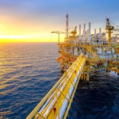 Offshore oil and gas rig platform with beautiful sky in the gulf