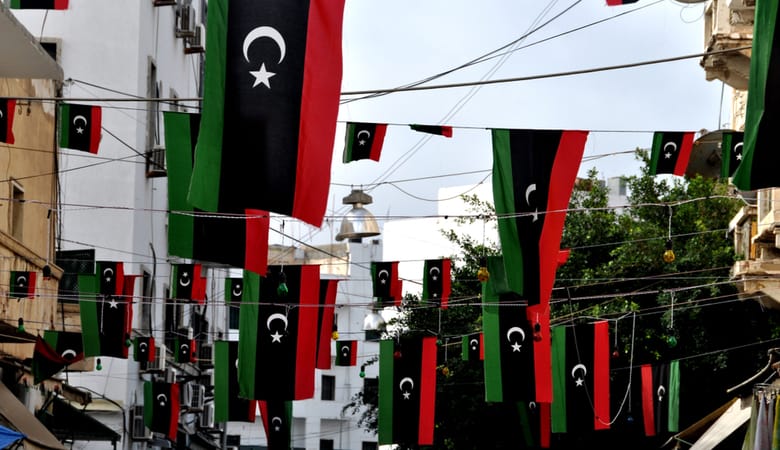 Libyans celebrate the liberation from the Qaddafi regime in the streets of Tripoli