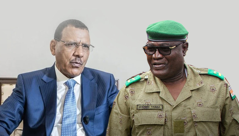 nigers military junta defies international pressure plans prosecution of deposed president