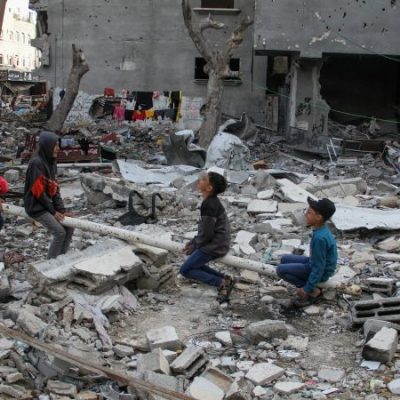 children play in rubble of gaza for eid holiday