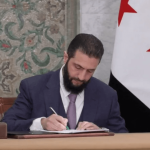 Syria's President Signs Temporary Constitution for Five-Year Transition Period